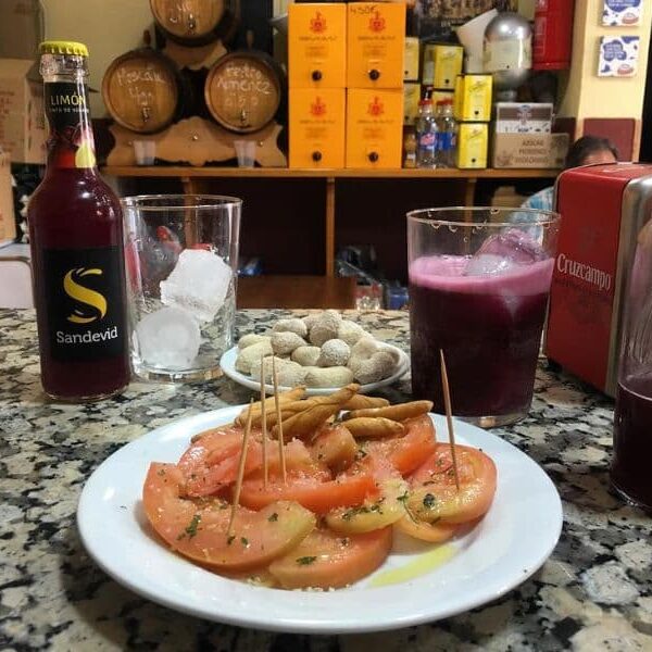 comer tomate aliñao en sevilla