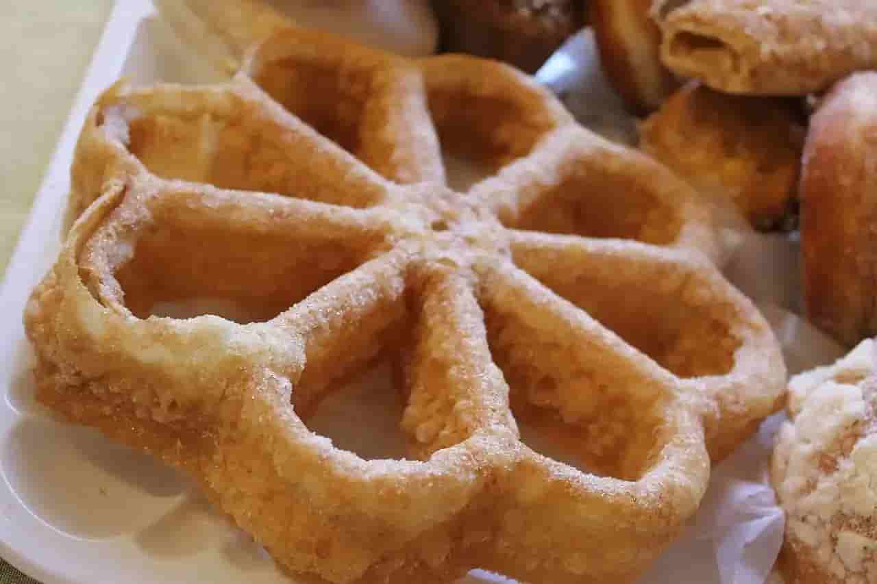El origen y la receta de los buñuelos de viento: El arte de freír el aire